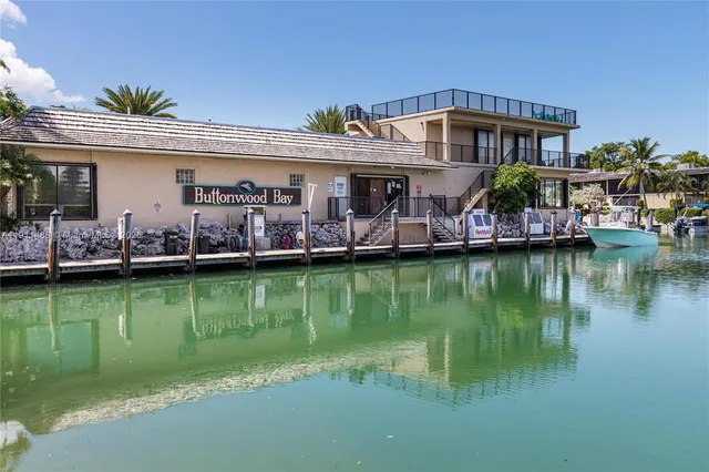 a front view of a house with a boat