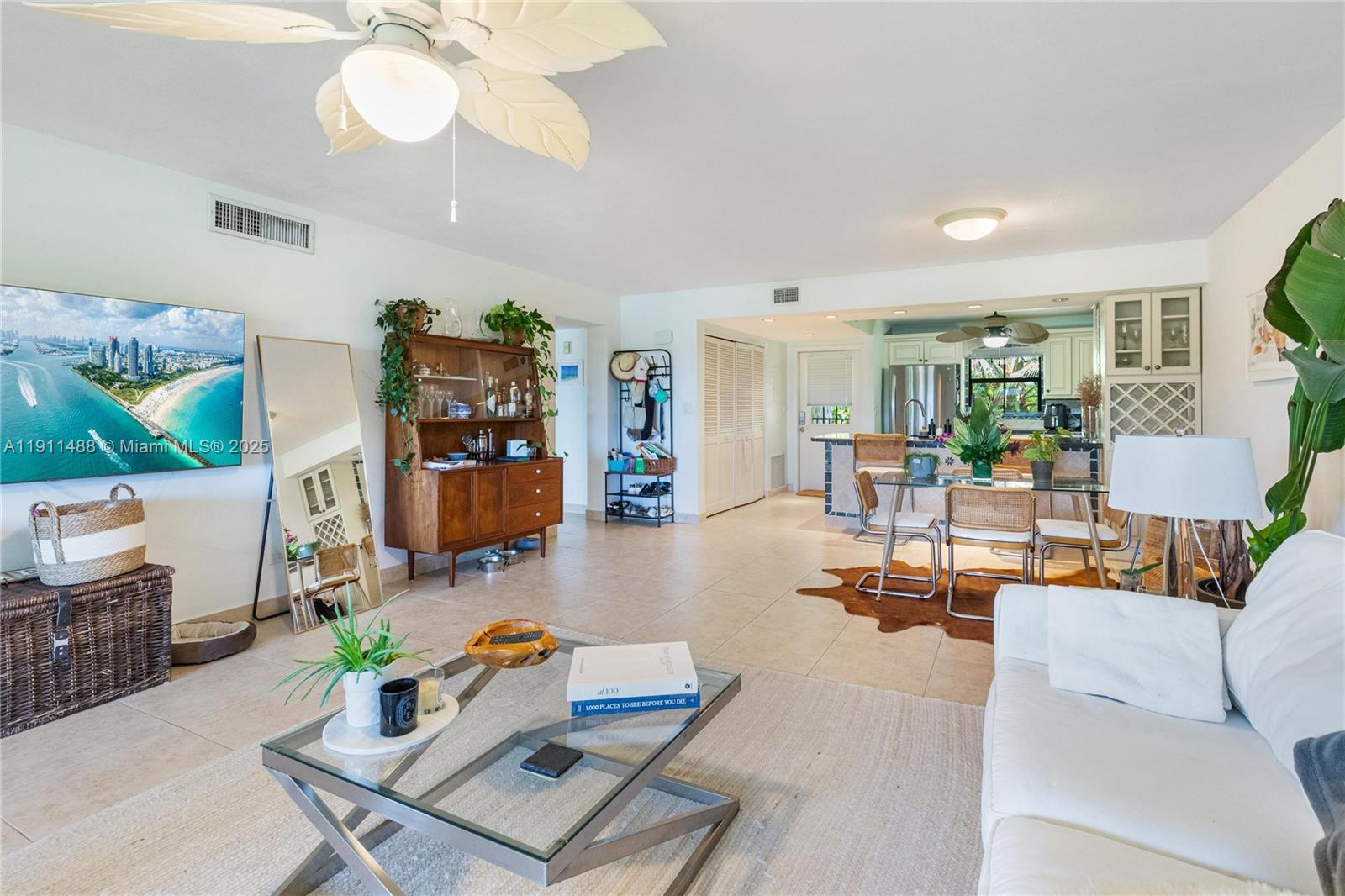 96000 Overseas Highway, Unit W44 Key Largo, FL 33037 - Photo 10 of 33 a living room with furniture and wooden floor