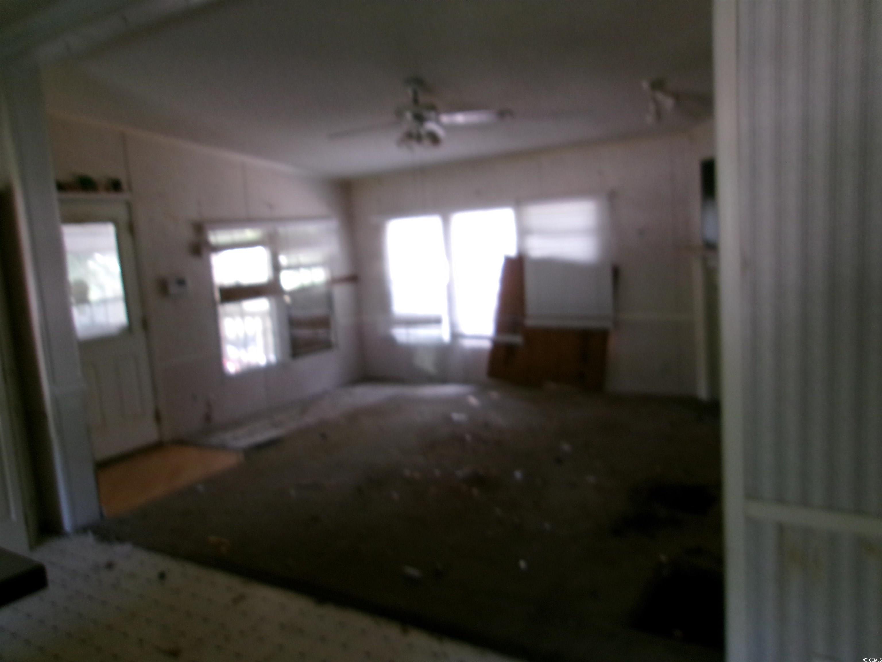 4261 Blake Road Myrtle Beach, SC 29588 - Photo 7 of 11 Interior space with a ceiling fan