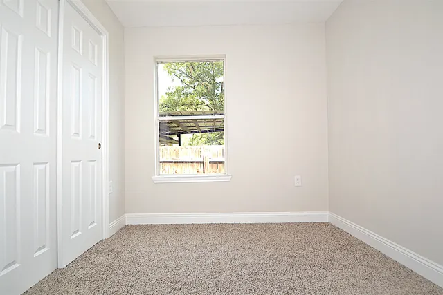 an empty room with a window
