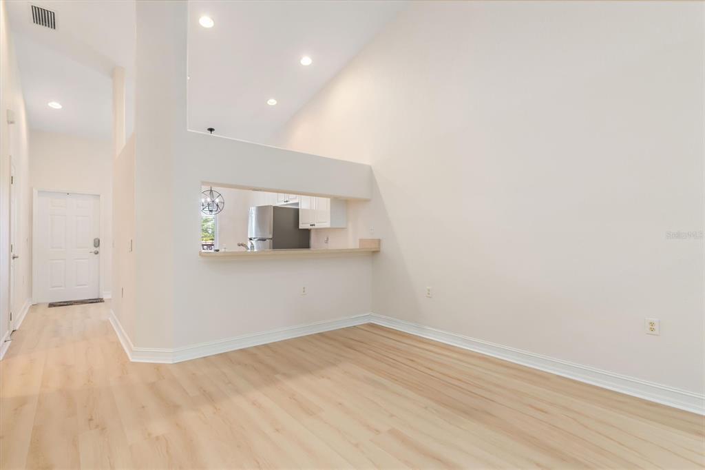 7196 North Plum Tree, Unit 323 Punta Gorda, FL 33955 - Photo 15 of 44 a view of empty room with wooden floor