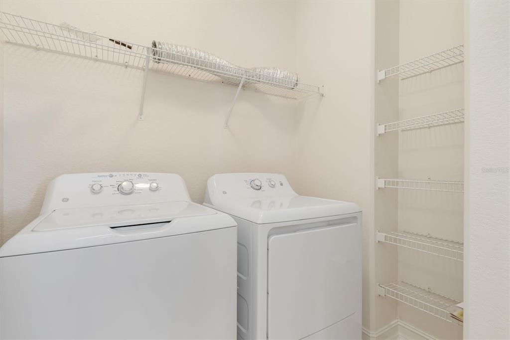 7196 North Plum Tree, Unit 323 Punta Gorda, FL 33955 - Photo 16 of 44 a utility room with dryer and washer