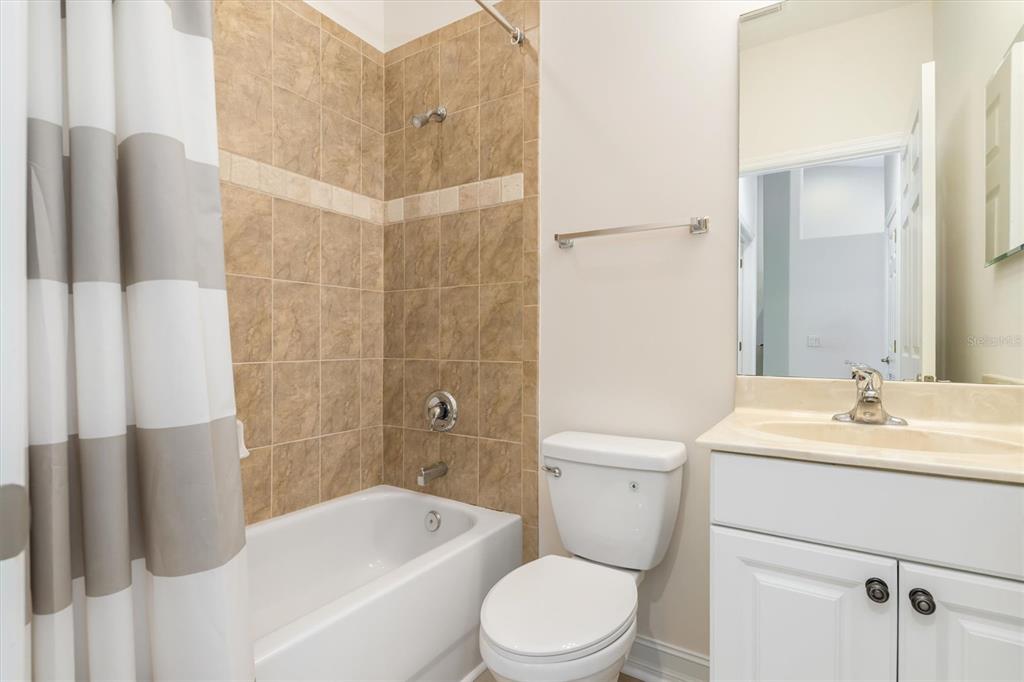 7196 North Plum Tree, Unit 323 Punta Gorda, FL 33955 - Photo 25 of 44 a bathroom with a sink a toilet and shower