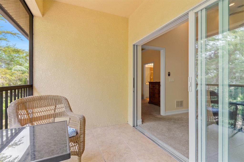 7196 North Plum Tree, Unit 323 Punta Gorda, FL 33955 - Photo 26 of 44 a view of hallway with bathroom and wooden floor