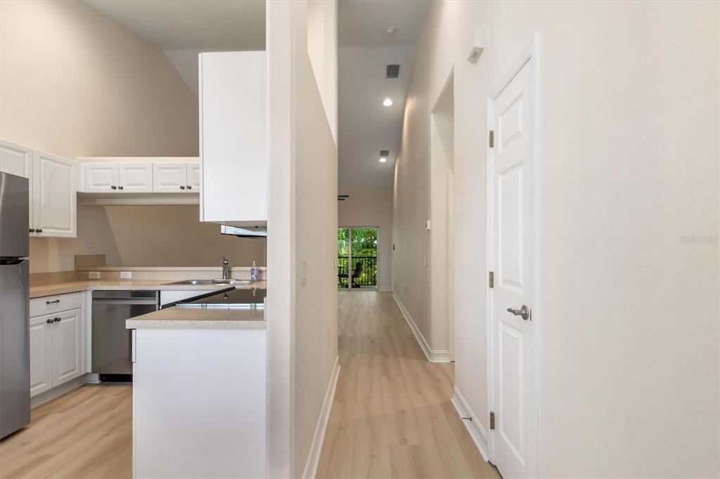 7196 North Plum Tree, Unit 323 Punta Gorda, FL 33955 - Photo 3 of 44 a kitchen with cabinets and a stove