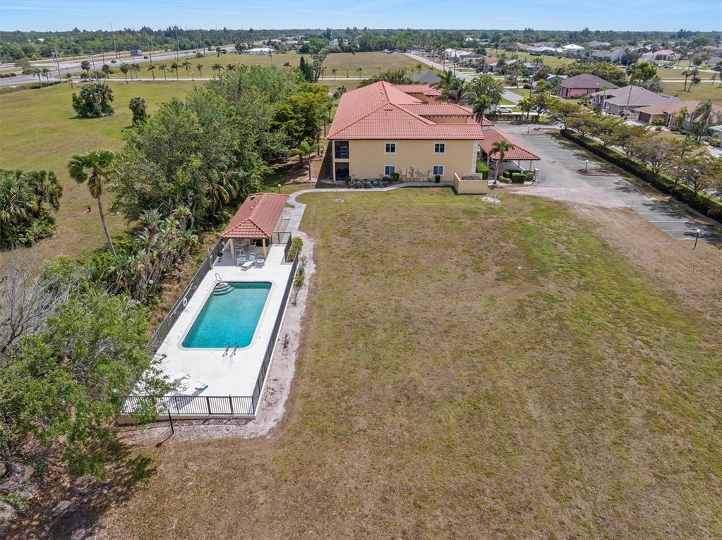 7196 North Plum Tree, Unit 323 Punta Gorda, FL 33955 - Photo 38 of 44 an aerial view of a house with outdoor space lake view