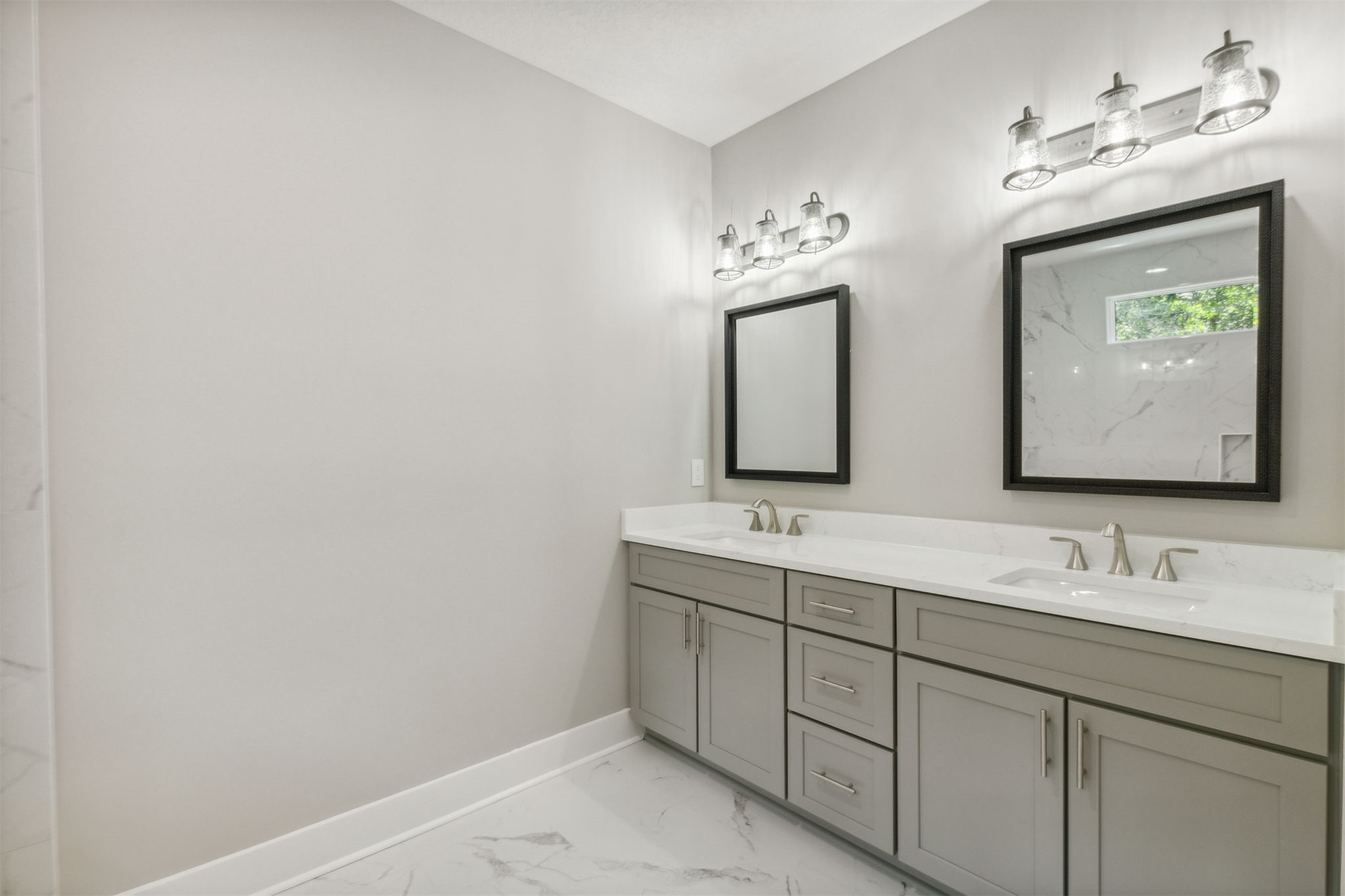 96050 Captains Pointe Road Yulee, FL 32097 - Photo 23 of 36 a bathroom with 2 sink and a mirror