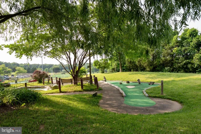 a house that has a tree in front of it