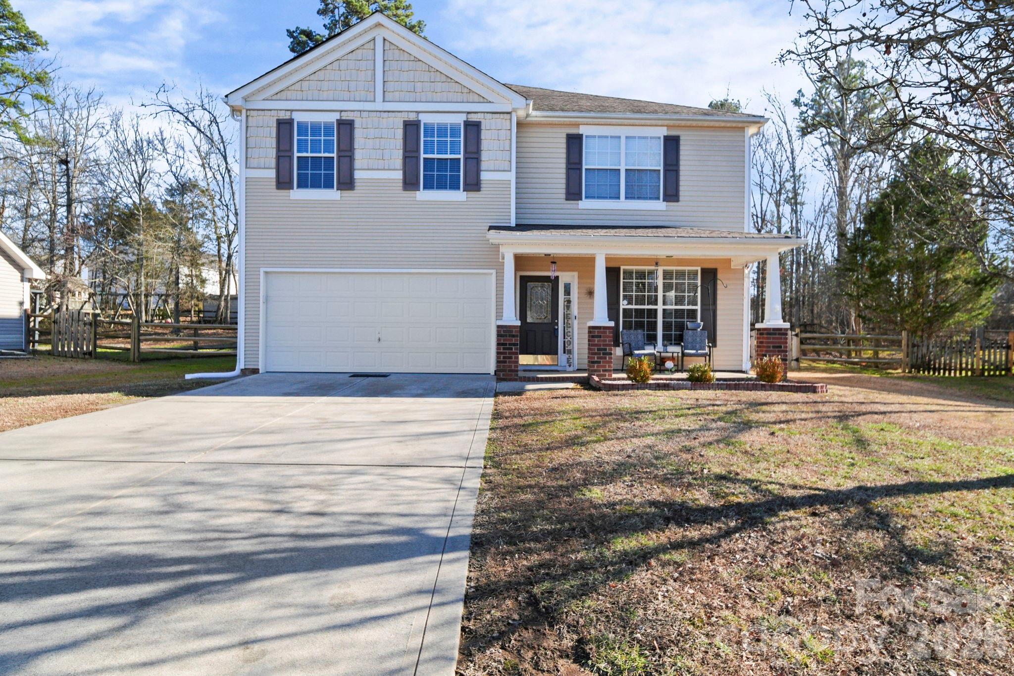 3035 Proverbs Court Monroe, NC 28110 - Photo 2 of 39 a view of a house with a yard and sitting area
