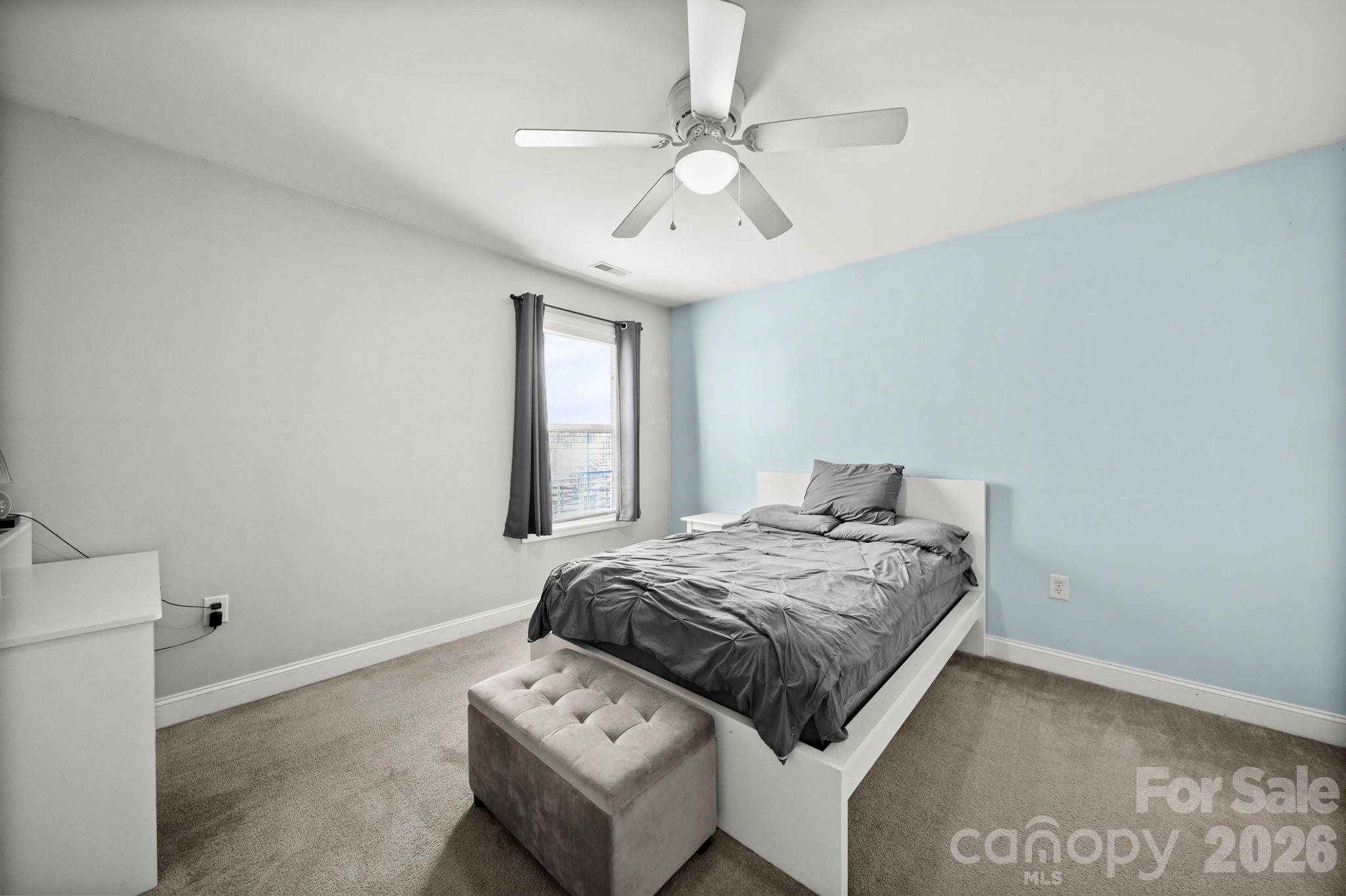 3035 Proverbs Court Monroe, NC 28110 - Photo 27 of 39 a bedroom with a bed and a window