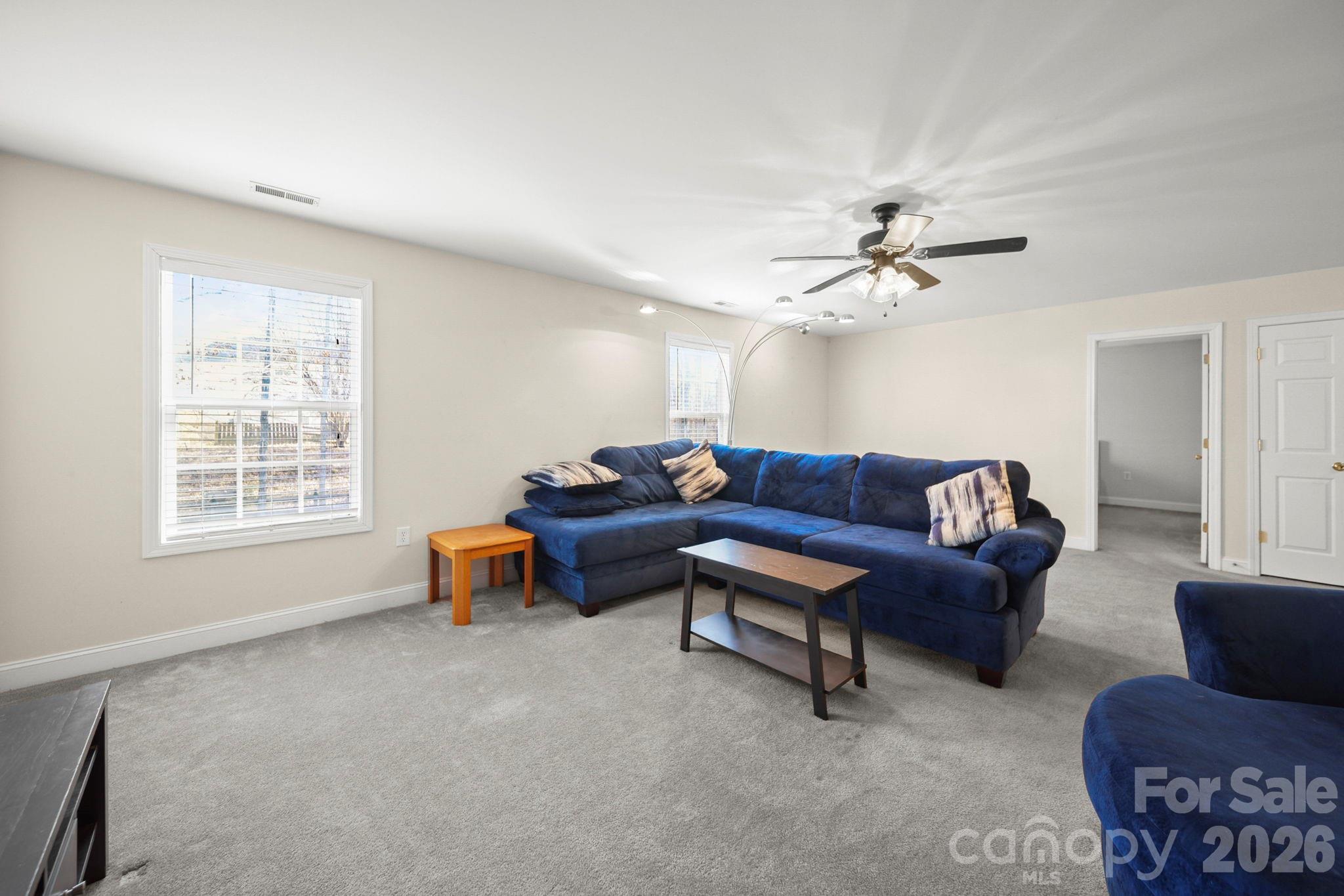 3035 Proverbs Court Monroe, NC 28110 - Photo 28 of 39 a living room with furniture and a window