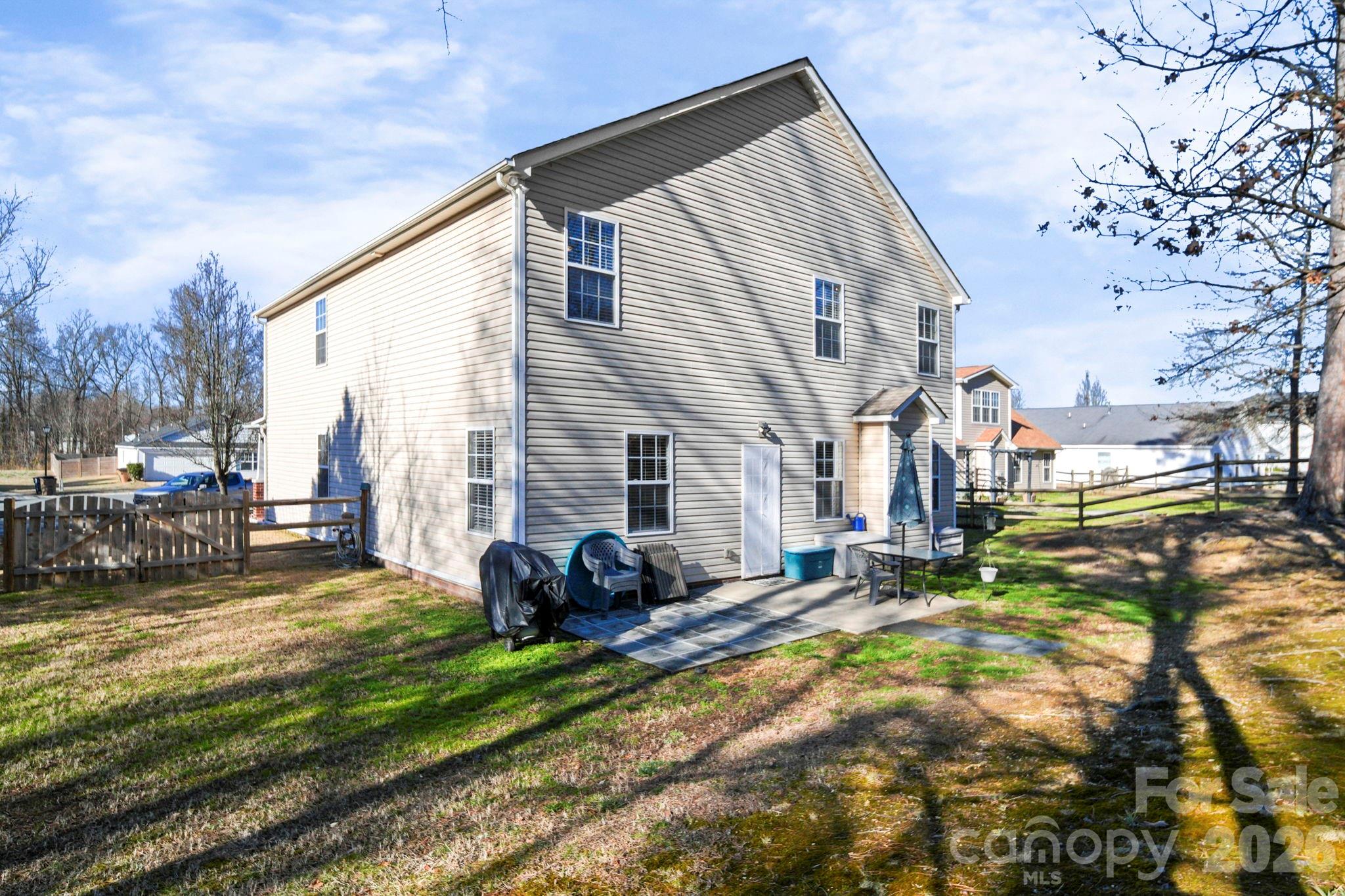 3035 Proverbs Court Monroe, NC 28110 - Photo 38 of 39 a view of a house with backyard and sitting area