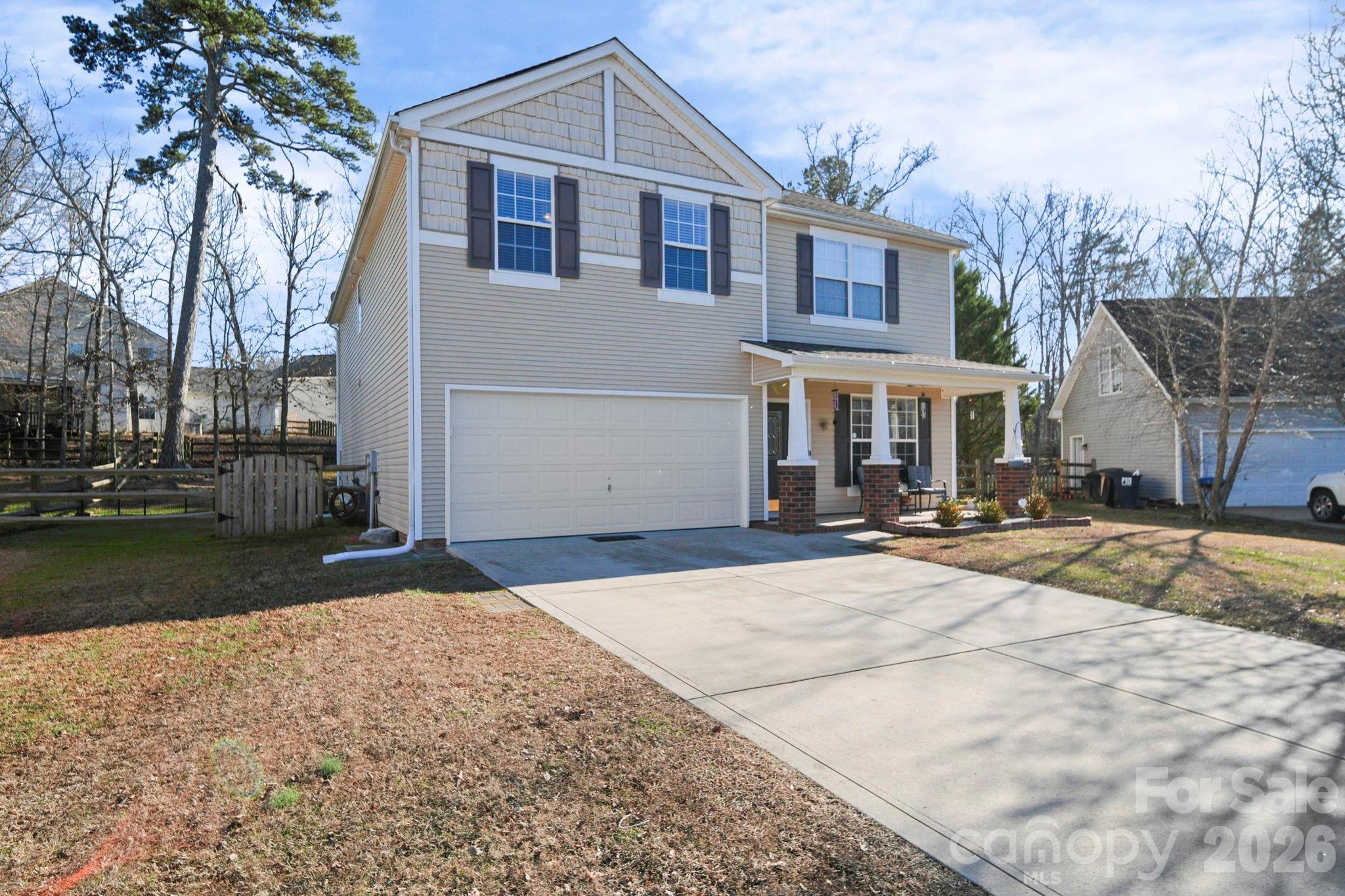 3035 Proverbs Court Monroe, NC 28110 - Photo 4 of 39 a front view of a house with a yard