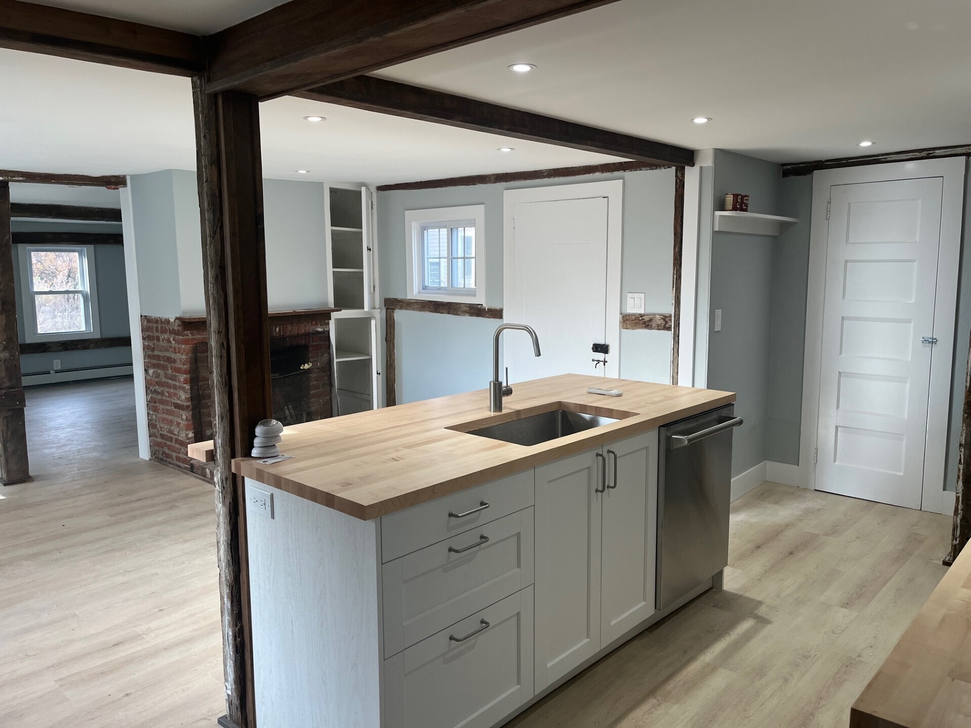 434 Hurlbutt Street Wilton, CT 06897 - Photo 5 of 14 a kitchen with a sink stove and refrigerator