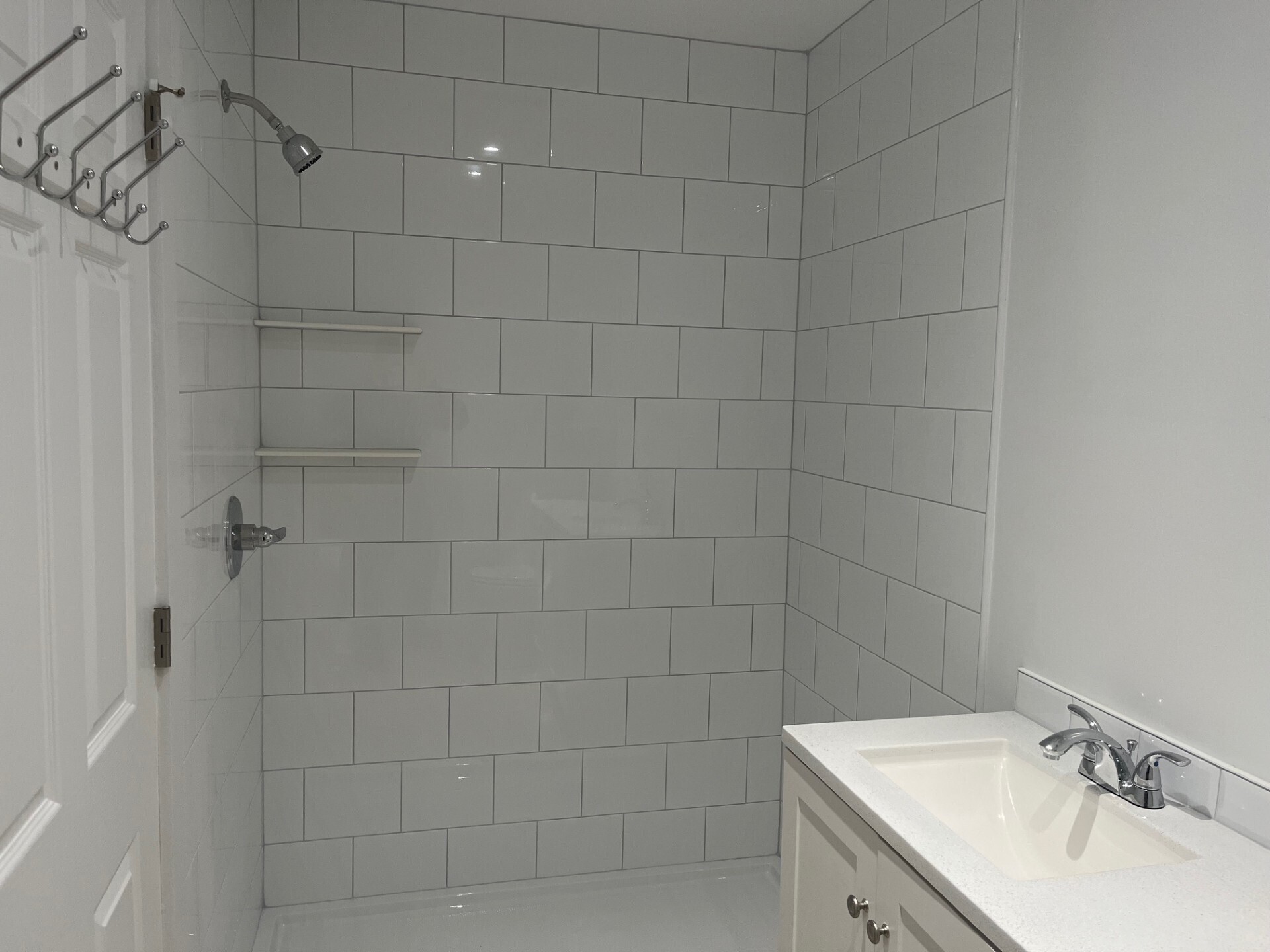 434 Hurlbutt Street Wilton, CT 06897 - Photo 7 of 14 a bathroom with a sink shower and a mirror