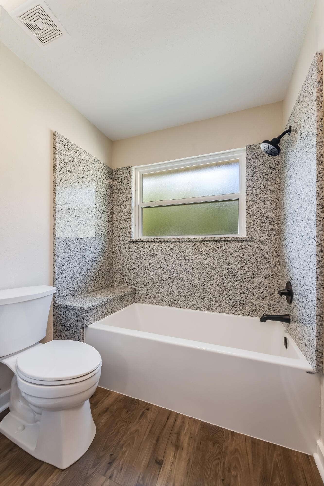 3005 Lillie Street Crestview, FL 32539 - Photo 30 of 46 a bathroom with a toilet and a bathtub