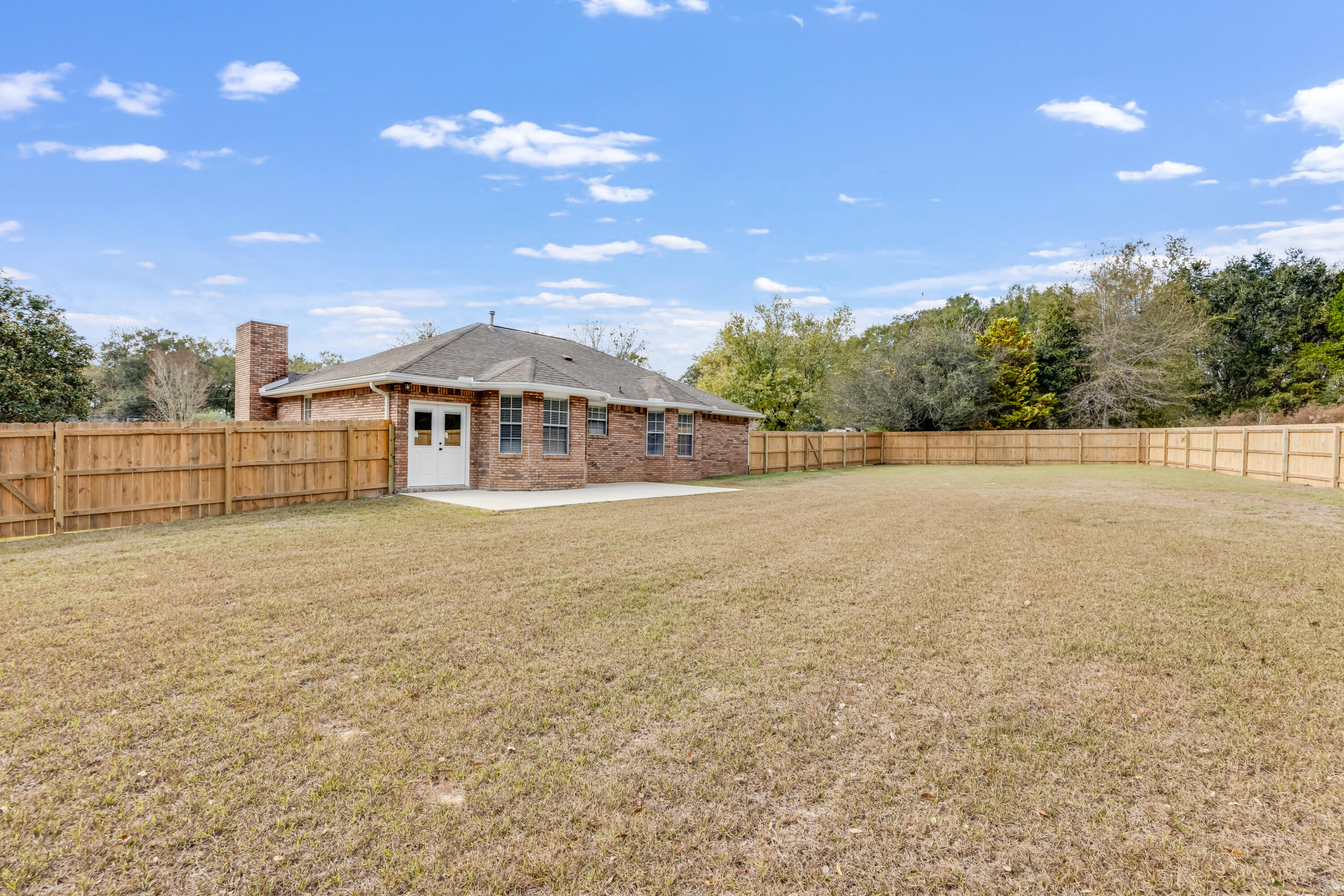 3005 Lillie Street Crestview, FL 32539 - Photo 36 of 46 a view of an ocean with a big yard