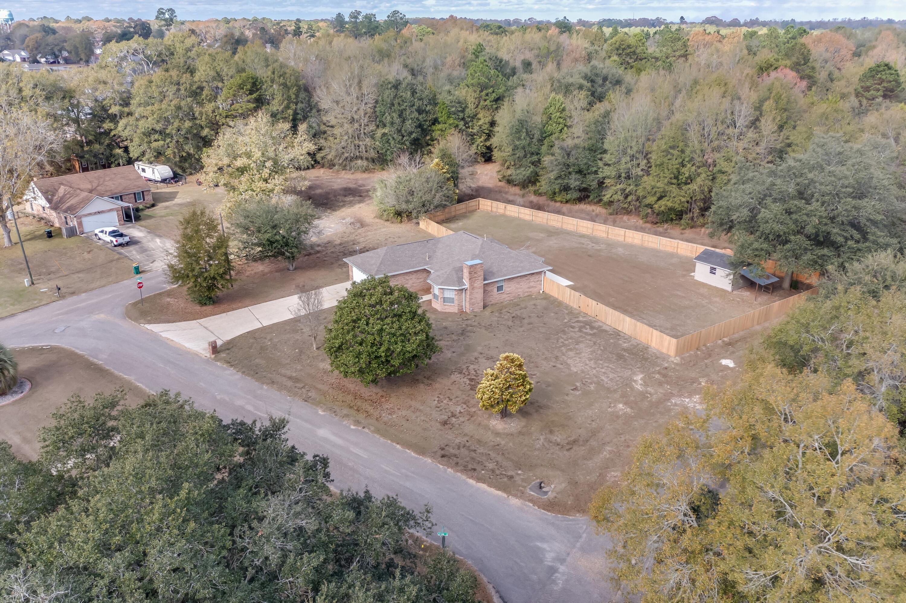 3005 Lillie Street Crestview, FL 32539 - Photo 43 of 46 an aerial view of a house with a yard