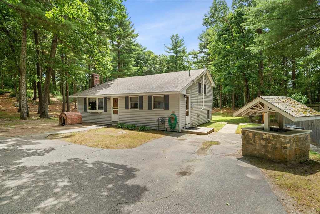 4 Lakeview Road Foxboro, MA 02035 - Photo 2 of 32 a front view of a house with a yard
