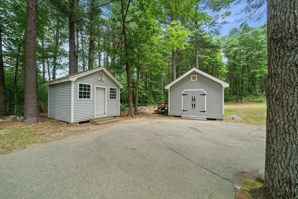 4 Lakeview Road Foxboro, MA 02035 - Photo 22 of 32 a view of a house with a yard and large trees
