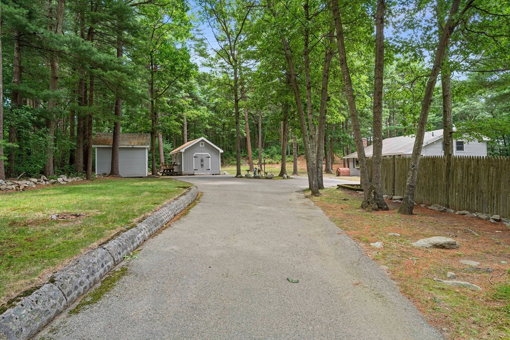 4 Lakeview Road Foxboro, MA 02035 - Photo 29 of 32 a house with trees in the background