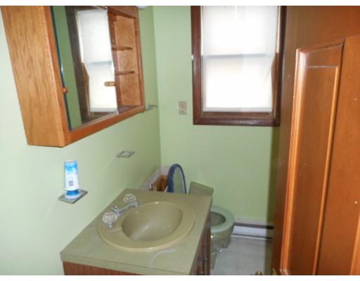 175 Turner Road Scituate, MA 02066 - Photo 12 of 24 a bathroom with a sink and a mirror