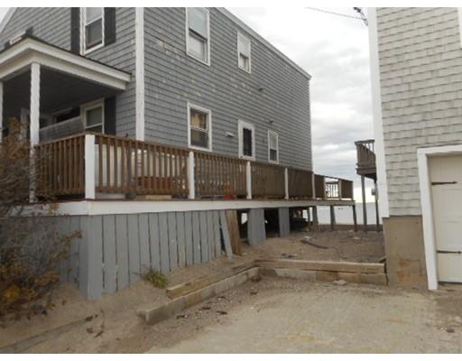 175 Turner Road Scituate, MA 02066 - Photo 5 of 24 a view of a house with a wooden fence