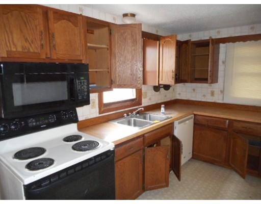 175 Turner Road Scituate, MA 02066 - Photo 10 of 24 a kitchen with a sink stove and cabinets