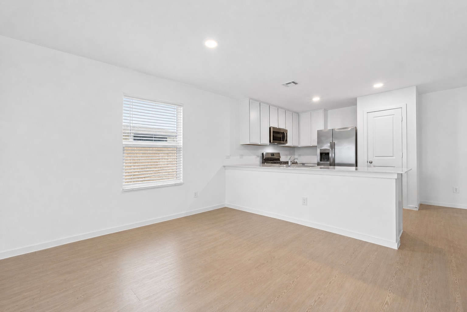 10720 Ellerston Road Cleveland, TX 77327 - Photo 31 of 32 AI generated image of unfurnished kitchen.