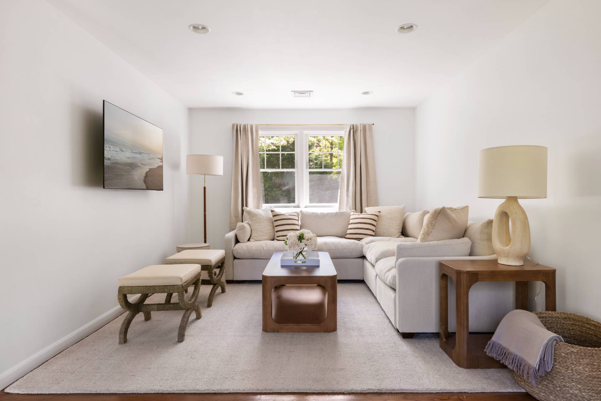 40 Ridge Road West Sag Harbor, NY 11963 - Photo 9 of 27 a living room with furniture and a large window