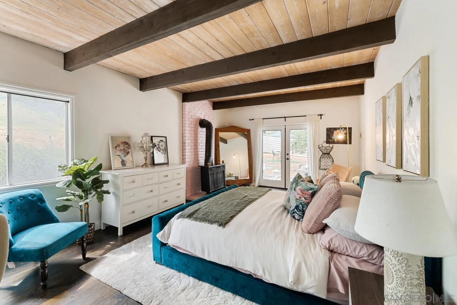 3517 Deer Lake Park Road Julian, CA 92036 - Photo 16 of 75 a spacious bedroom with a balcony a bed and a couch