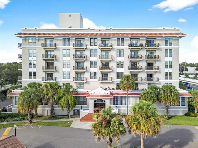a front view of a building with garden