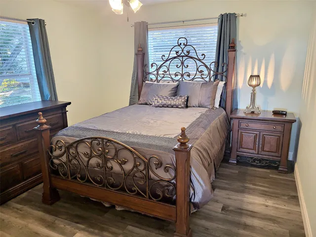 a view of a dresser with wooden floor