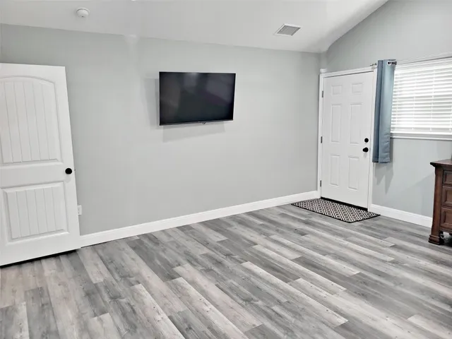 a bathroom with a granite countertop sink mirror and double