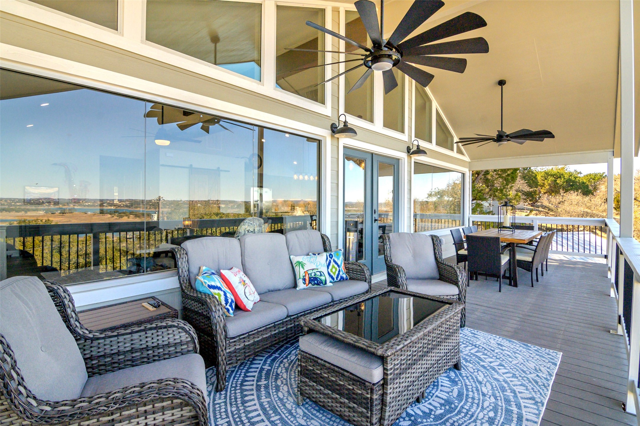 1526 Lakeside Drive West Canyon Lake, TX 78133 - Photo 3 of 35 The balcony was designed for the ultimate in comfort with oversize lounge seating, outdoor dining for 6 and a built in gas grill.