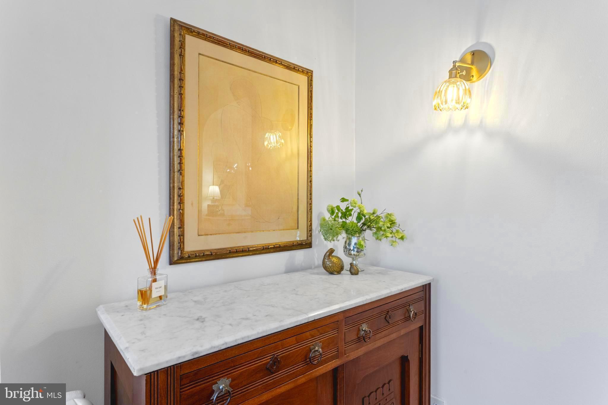 110 Murdock Road Baltimore, MD 21212 - Photo 8 of 28 a bathroom with a granite countertop sink and a mirror