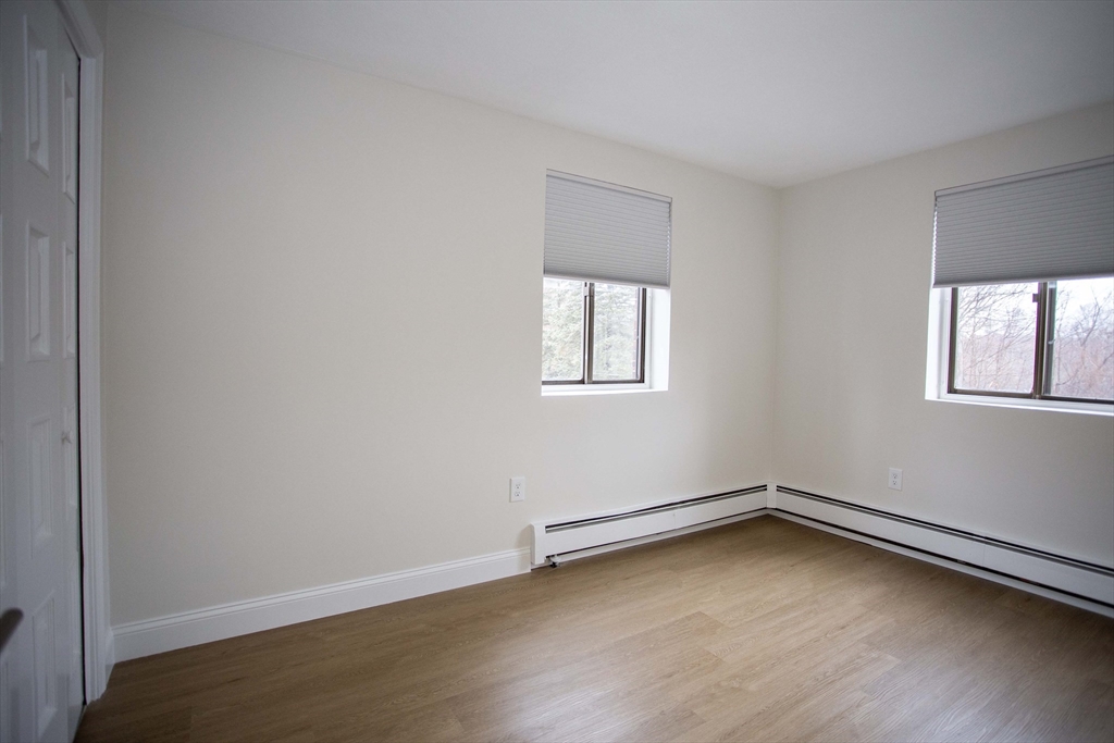 5 Washington Street, Unit C9 Reading, MA 01867 - Photo 11 of 21 an empty room with a window