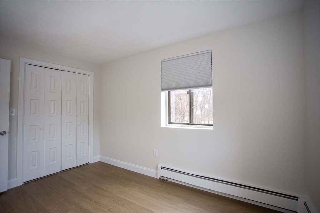 5 Washington Street, Unit C9 Reading, MA 01867 - Photo 12 of 21 an empty room with a window
