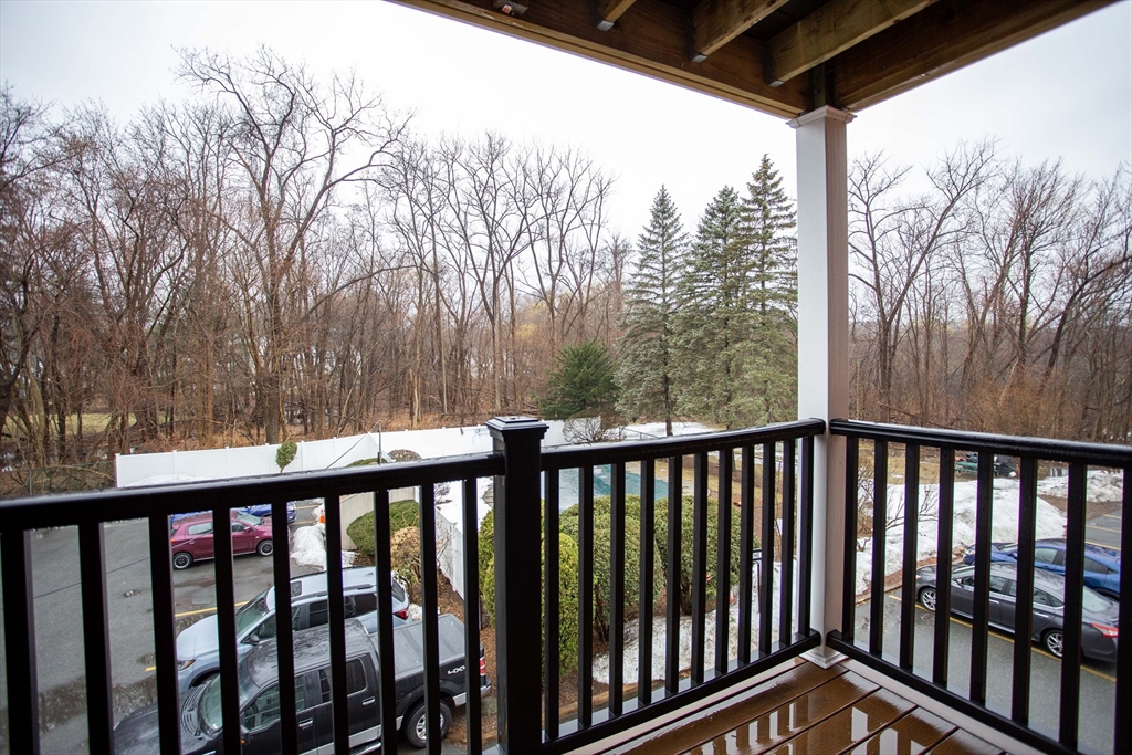 5 Washington Street, Unit C9 Reading, MA 01867 - Photo 18 of 21 a view of a balcony with outdoor space