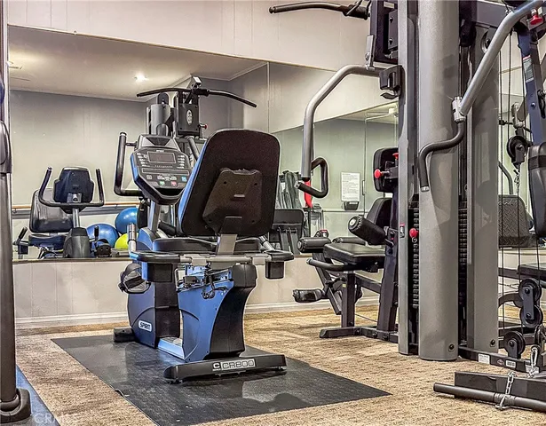 a view of room with gym equipment