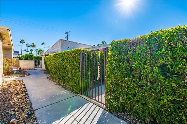 a view of a house with a street