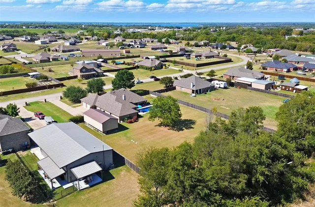 an aerial view of a house with a garden