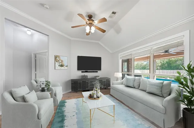 a view of a livingroom with a flat screen tv