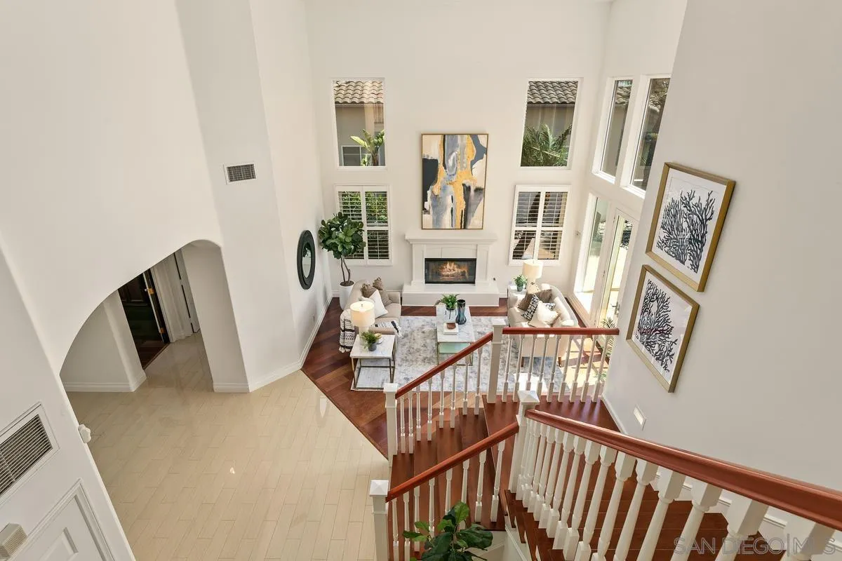 7337 Melodia Terrace Carlsbad, CA 92011 - Photo 22 of 42 a view of living room with furniture and wooden floor