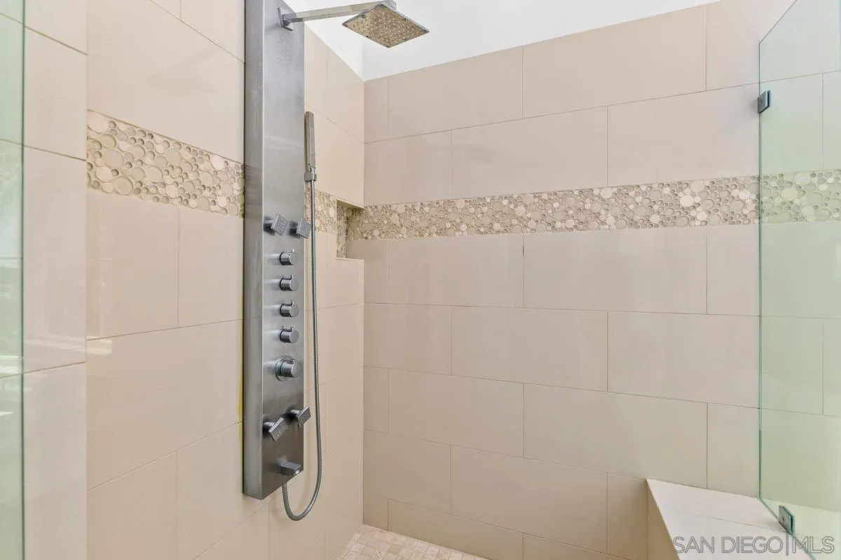 7337 Melodia Terrace Carlsbad, CA 92011 - Photo 28 of 42 a bathroom with a shower