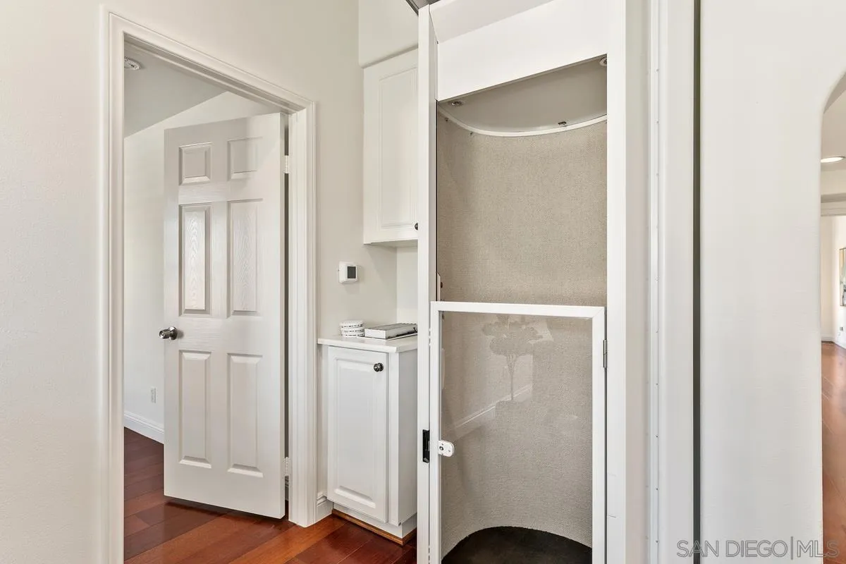 7337 Melodia Terrace Carlsbad, CA 92011 - Photo 31 of 42 a view of a bathroom with wooden floor