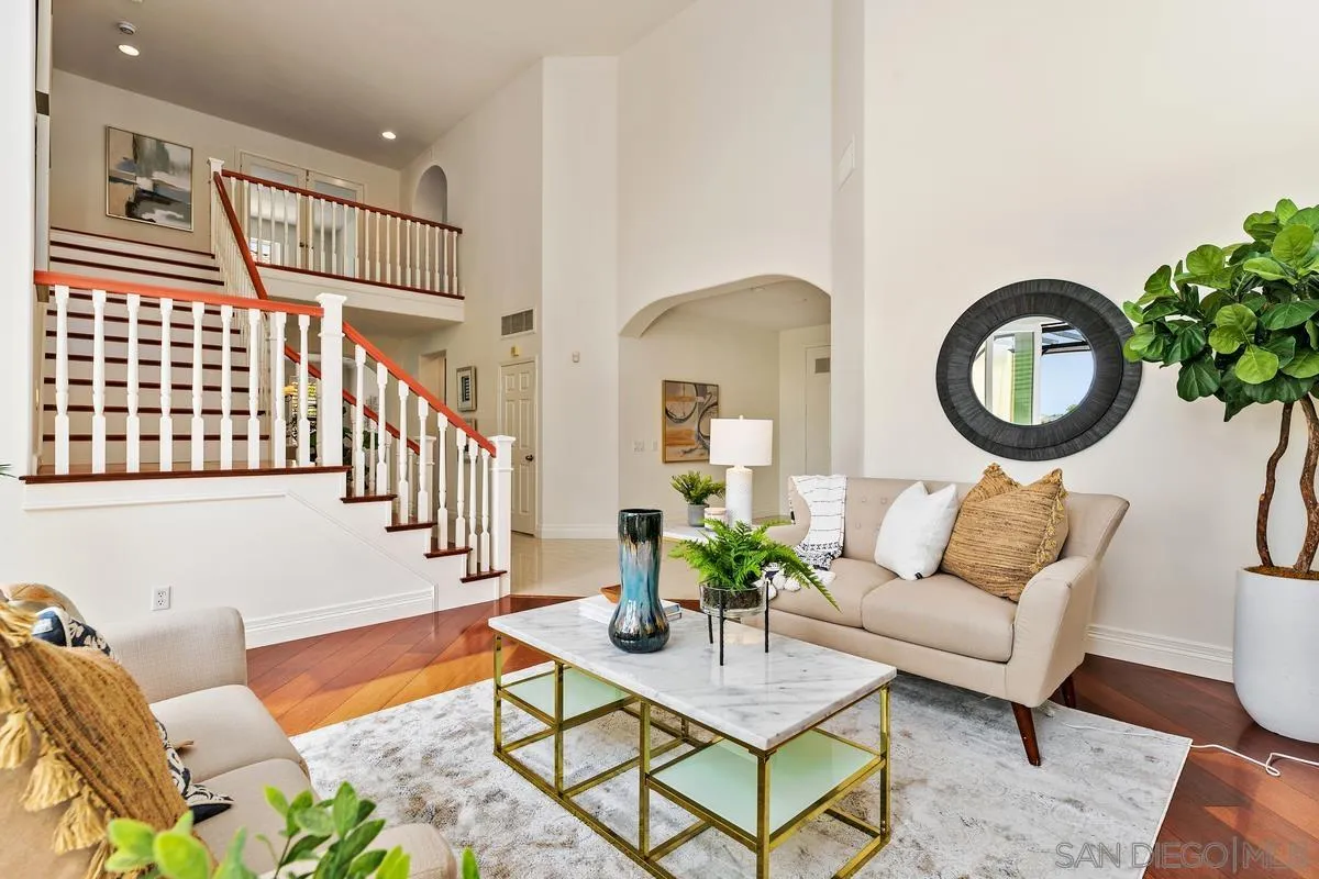7337 Melodia Terrace Carlsbad, CA 92011 - Photo 6 of 42 a living room with furniture and wooden floor