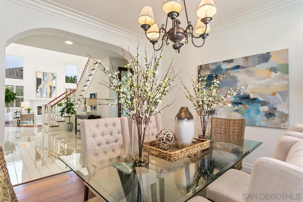 7337 Melodia Terrace Carlsbad, CA 92011 - Photo 8 of 42 a living room with furniture flowerpot and wooden floor