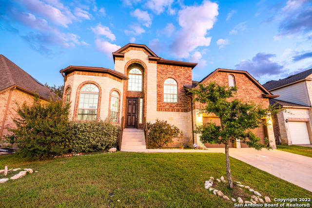 25538 Willard Path San Antonio, TX 78261 - Photo 1 of 1 a front view of a house with garden