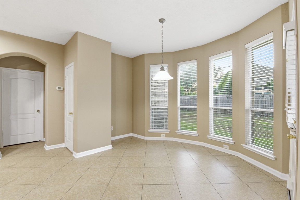 24938 Crystal Stone Lane Katy, TX 77494 - Photo 24 of 50 a view of an empty room with a window